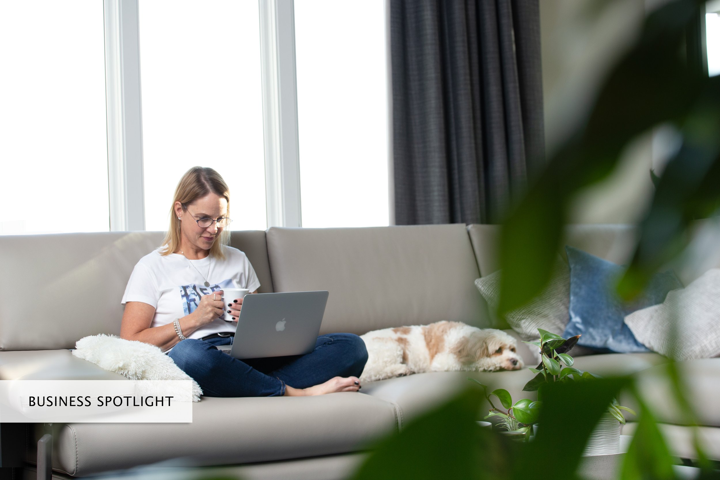 Burlington Branding Photographer Lifestyle woman on sofa with dog.jpg