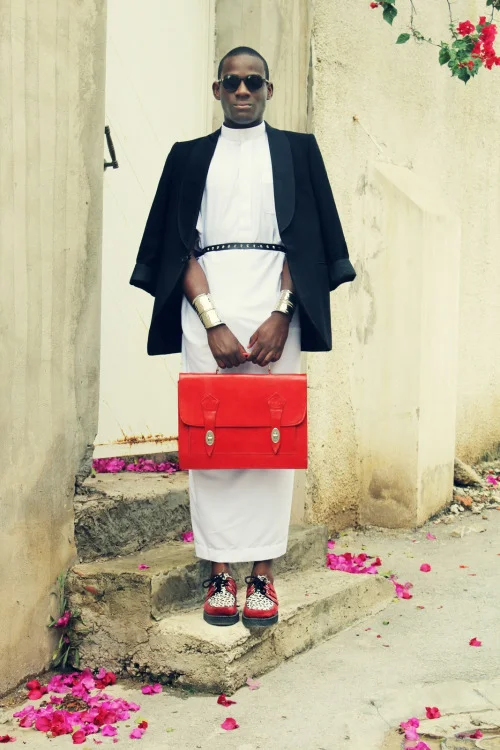 What's not to love here?! I love how he plays with tradition, formality, and infuses the outfit with fun through colorful details. 