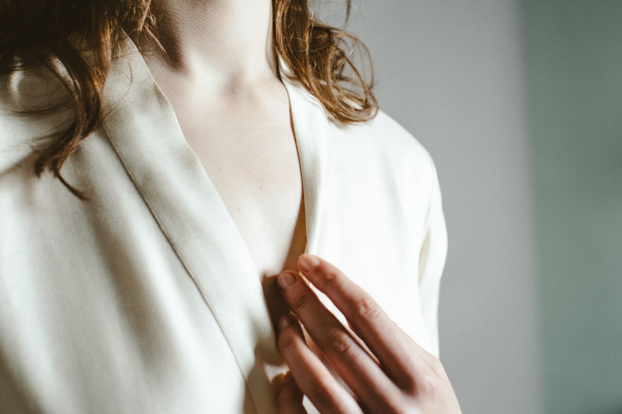 Ivory silk robe .