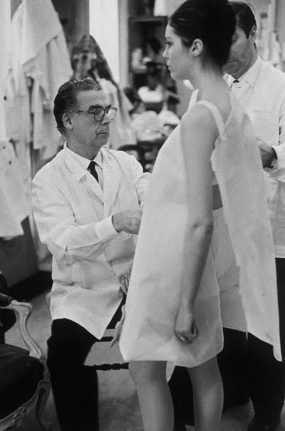 Cristóbal Balenciaga in his atelier in 1958. Photo by Henri Cartier-Bresson. 