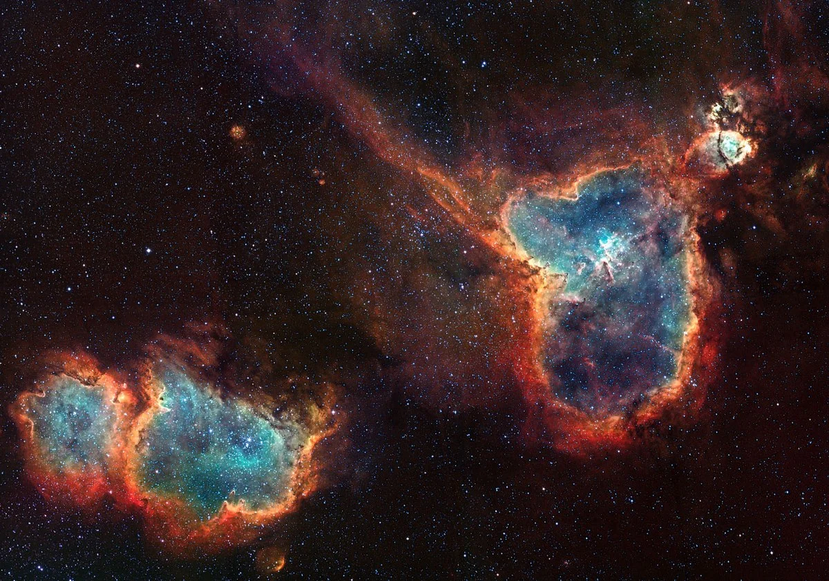 The Heart and Soul nebulas. Credit & Copyright: David Lindemann via NASA’s Astronomy Picture of the Day.