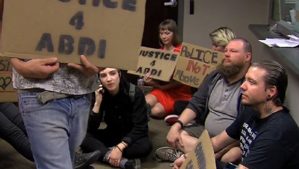 Utah Against Police Brutality holding a Sit-In at Salt Lake DA Sim Gill's office Downtown demanding the charges be dropped against Abdi Mohammed...courtesy of KUTV
