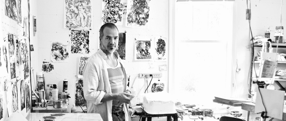 New artist Simon Shawn Andrews in his studio.