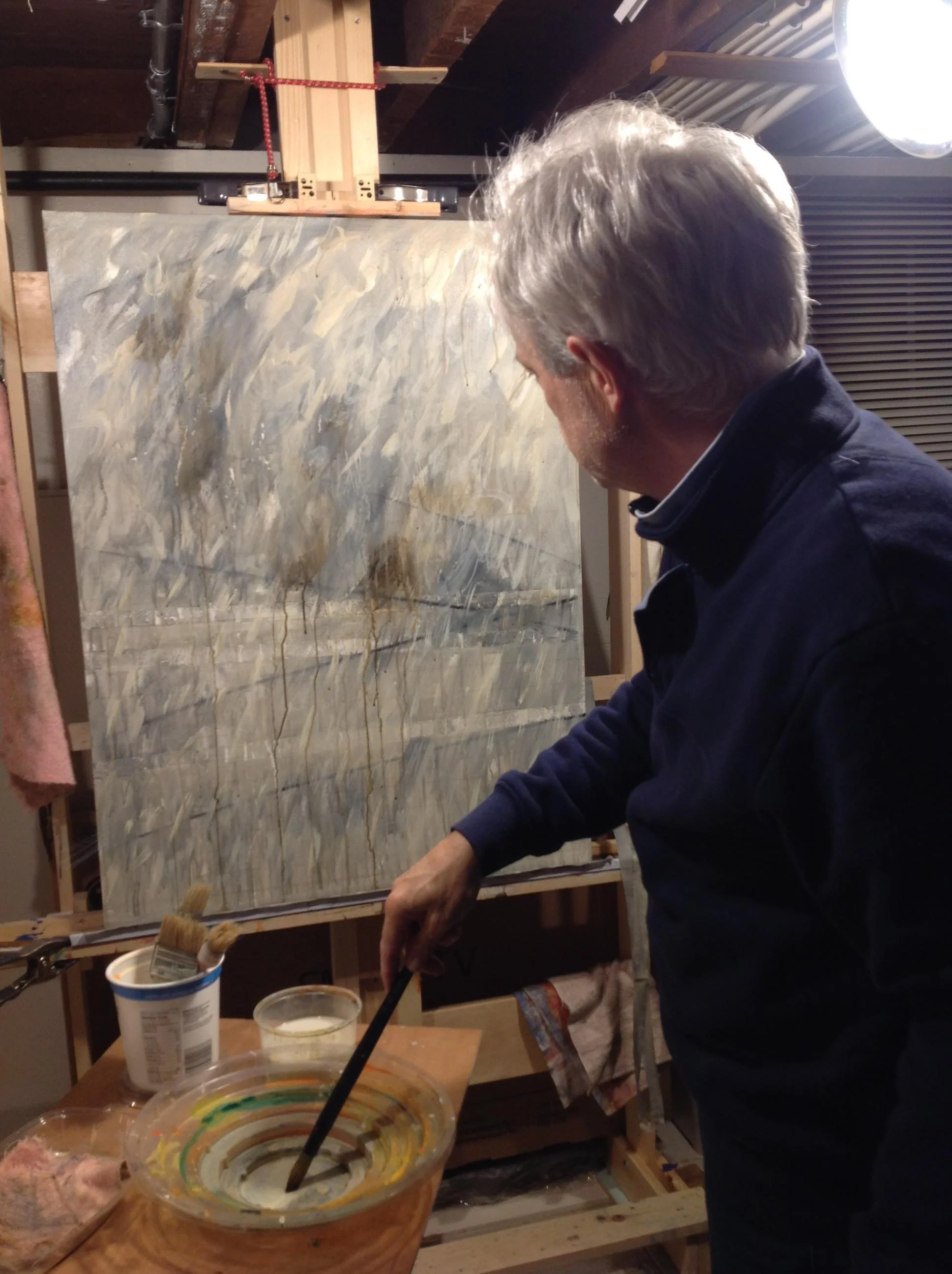 New artist, Ron Fortier working on a painting