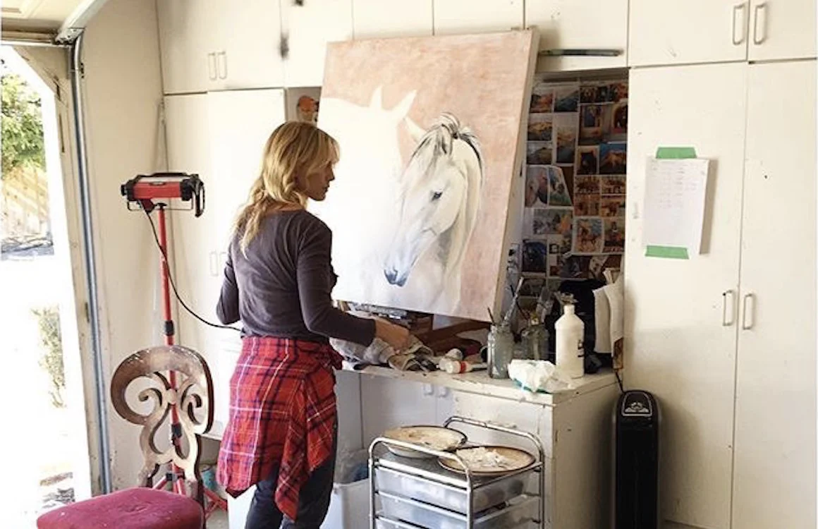 New artist Alana Clumeck working in her studio.