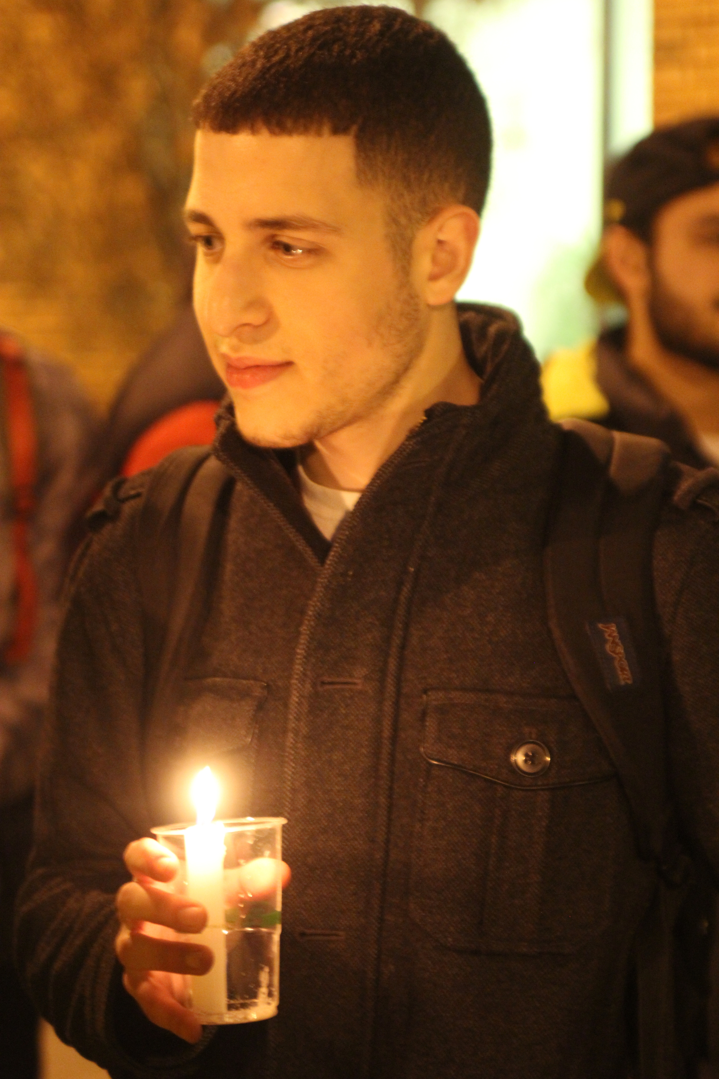   Sami Mubarak, dental student at The Ohio State University, attends a candlelight vigil held for the three Muslim Americans, Deah Barakat, Yusor Abu-Salha and Razan Abu-Salha,&nbsp;murdered in Chapel Hill, North Carolina. February, 2015.  