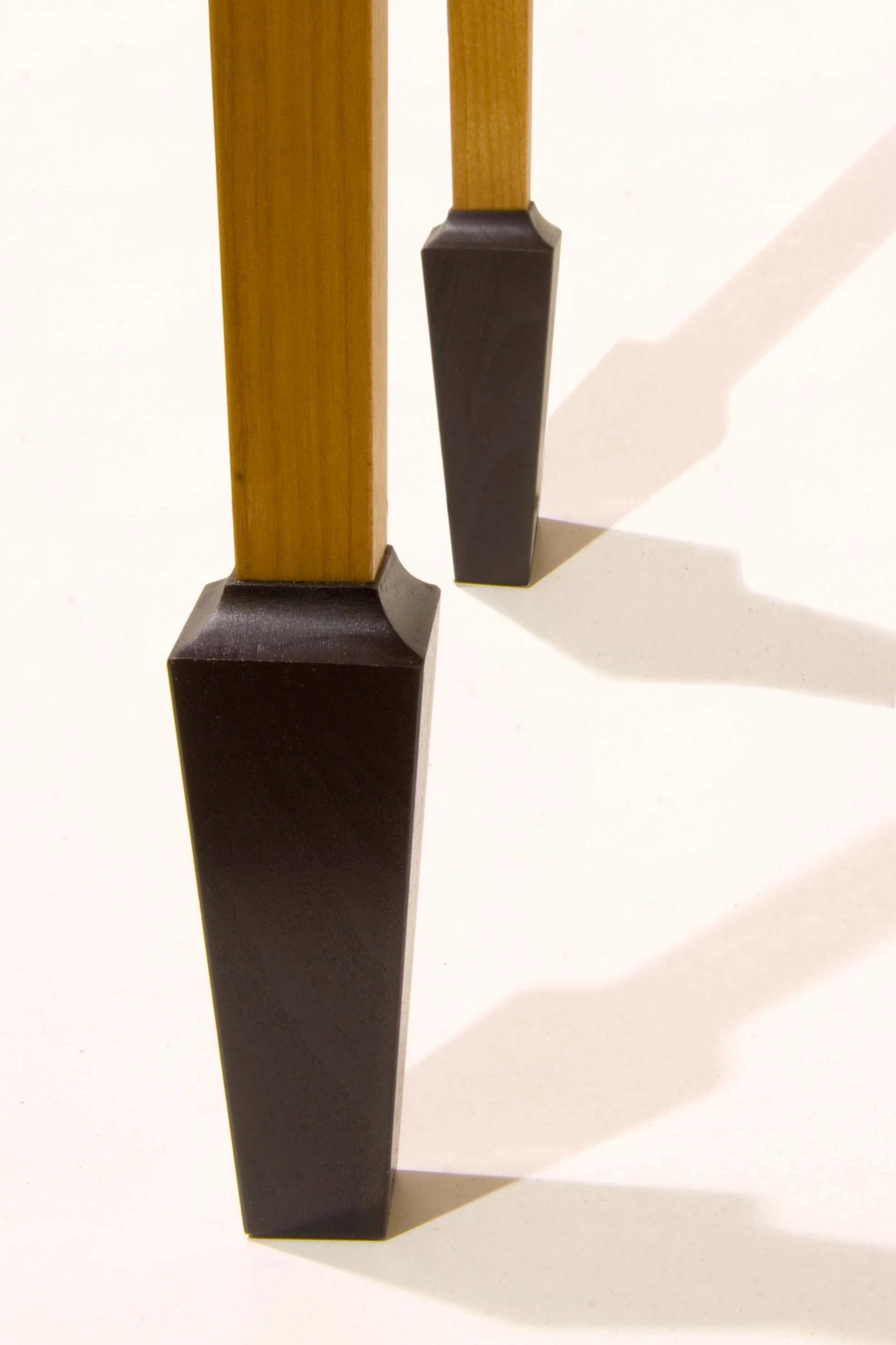 “Stiletto” Ebonised foot detail.