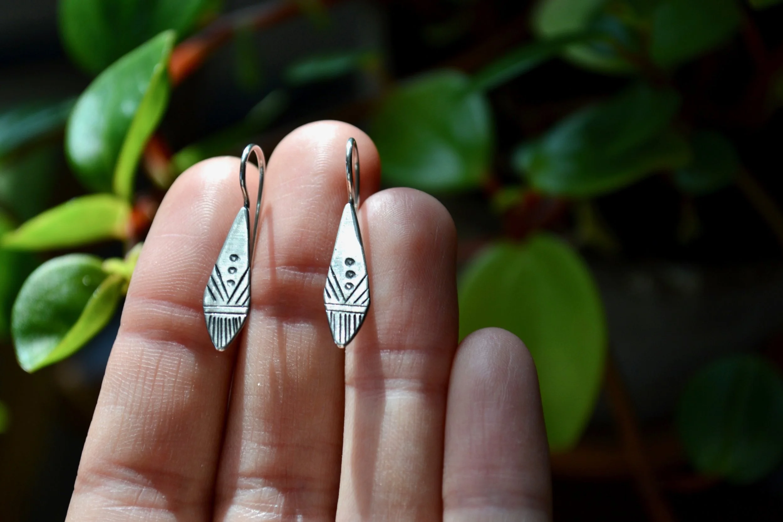 tribal earrings.jpeg