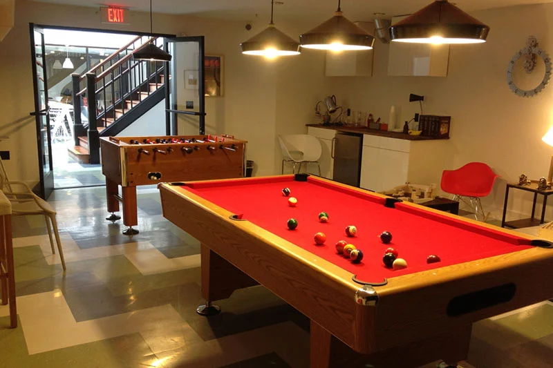 At WeWork's co-working office facilities, you will find foosball and pool tables, but you won't find any red meat, pork or poultry as the company tries to reduce its environmental impact. Credit: Yusuke Kawasaki, FlickrCC