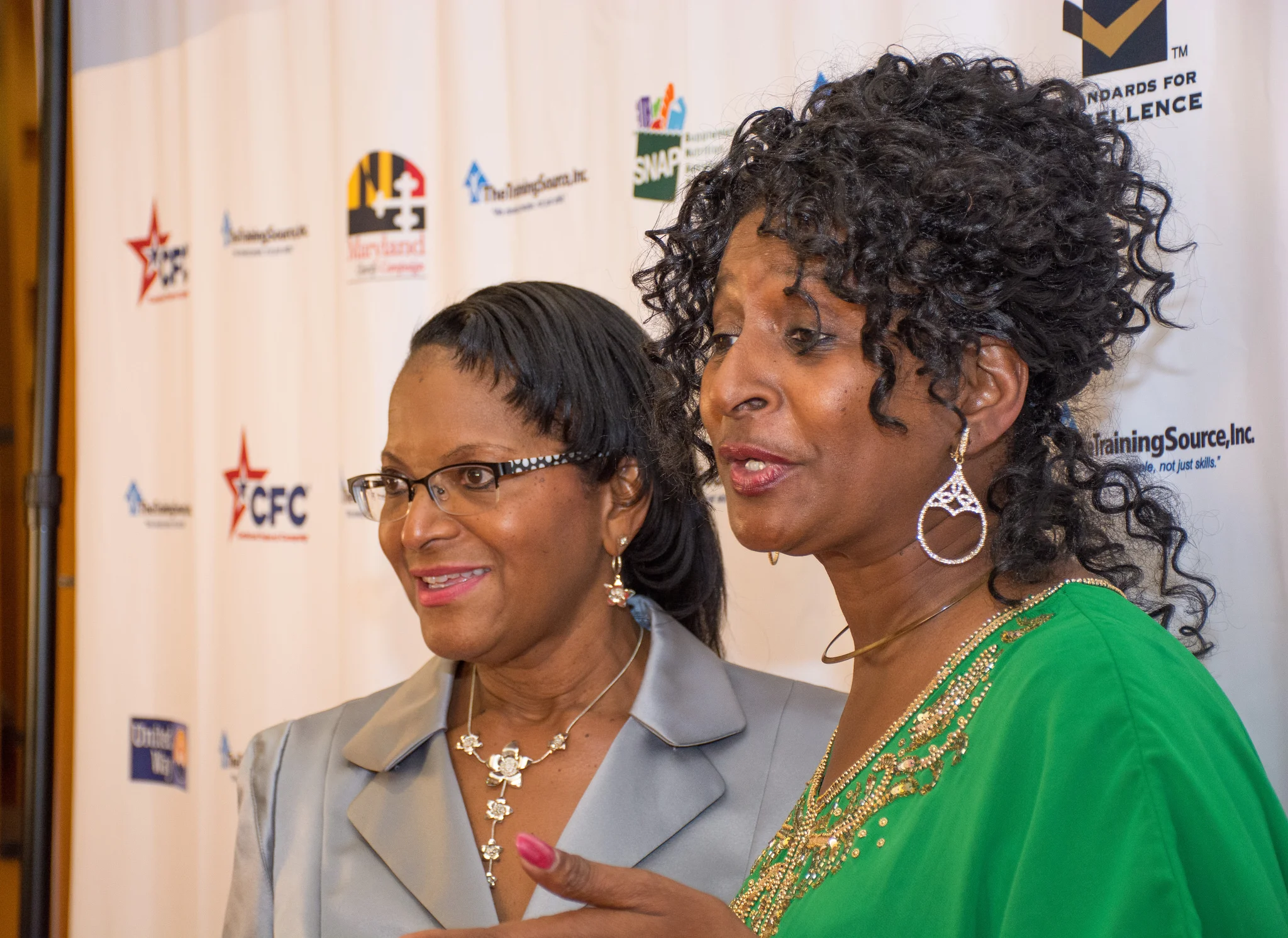 The Training Source’s Kim Rhim with Barbara Streeter. PHOTO: AMIR STOUDAMIRE // PRINCE GEORGE’S SUITE MAGAZINE & MEDIA