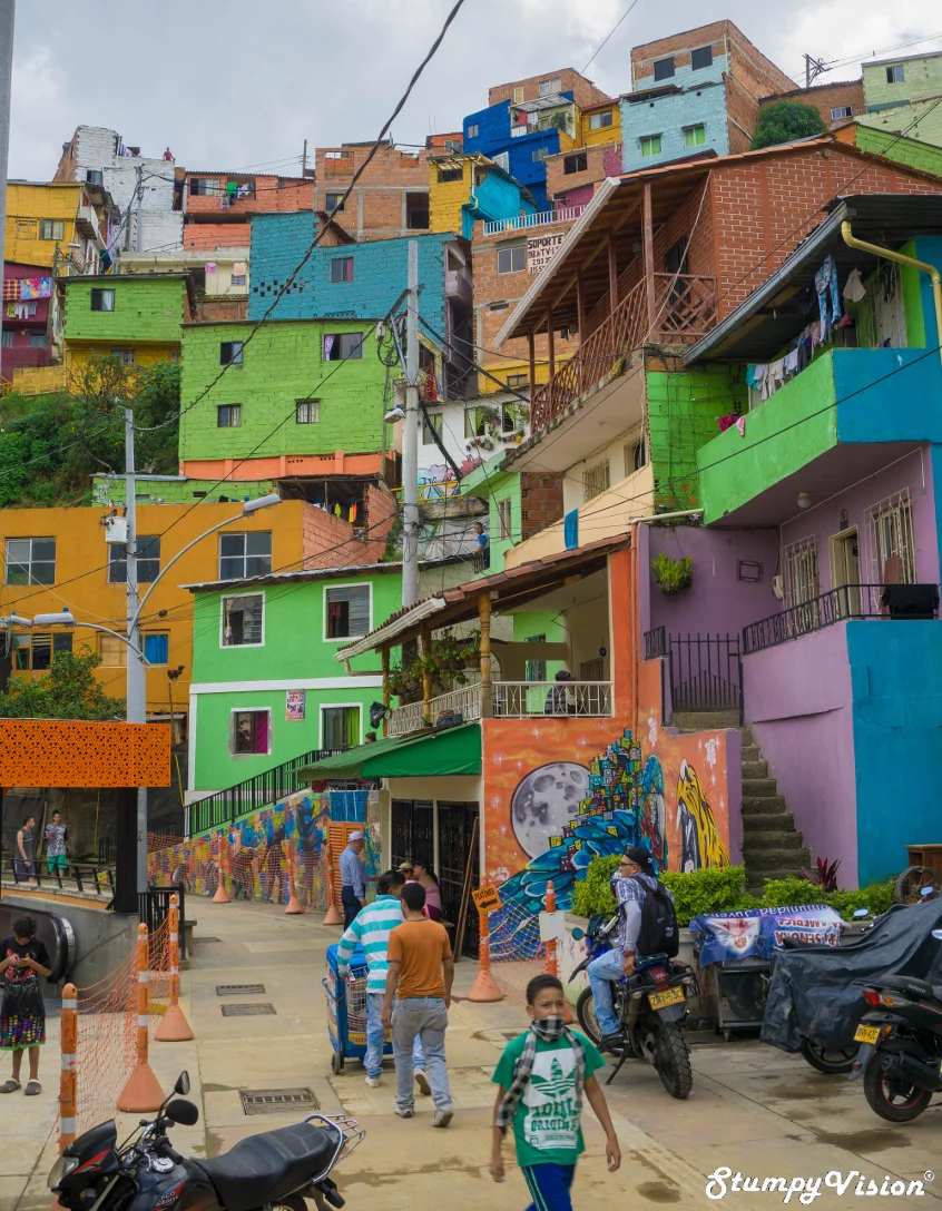 Comuna 13 former Pablo stronghold now rejuvenated tourist attraction.