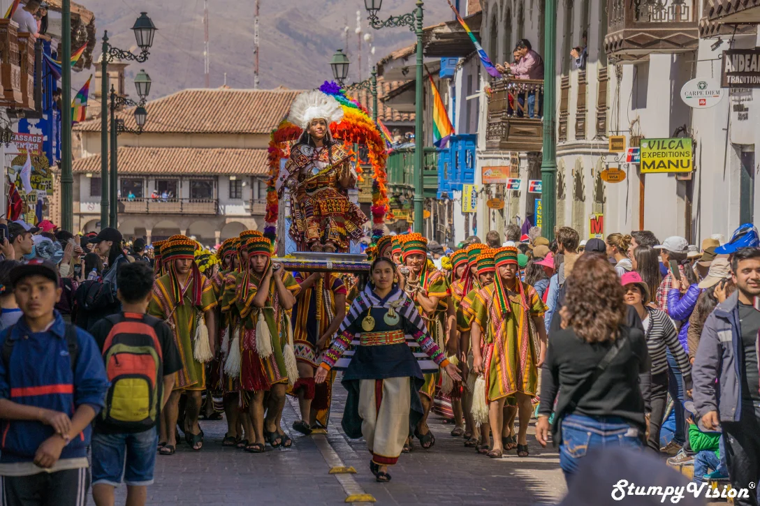 The precoccession through the streets of Cusco.
