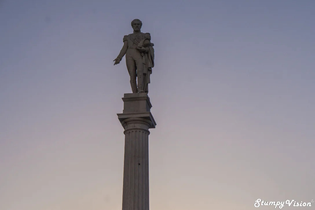 Some dude on a pole.