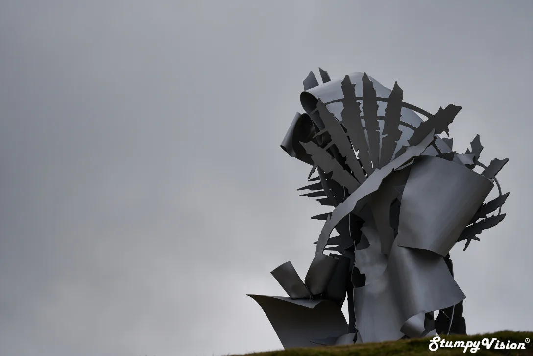 Albert Paley, Languorous Repose . I love how this steam punk esque sculpture ominously compliments the moody grey sky backdrop.