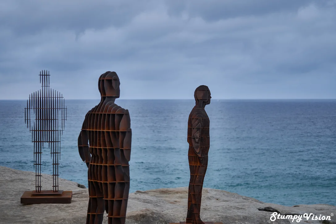 April Pine, Shifting Horizons . Loving the contrast of the rust texture with the blue sea and grey sky on this moody capture.