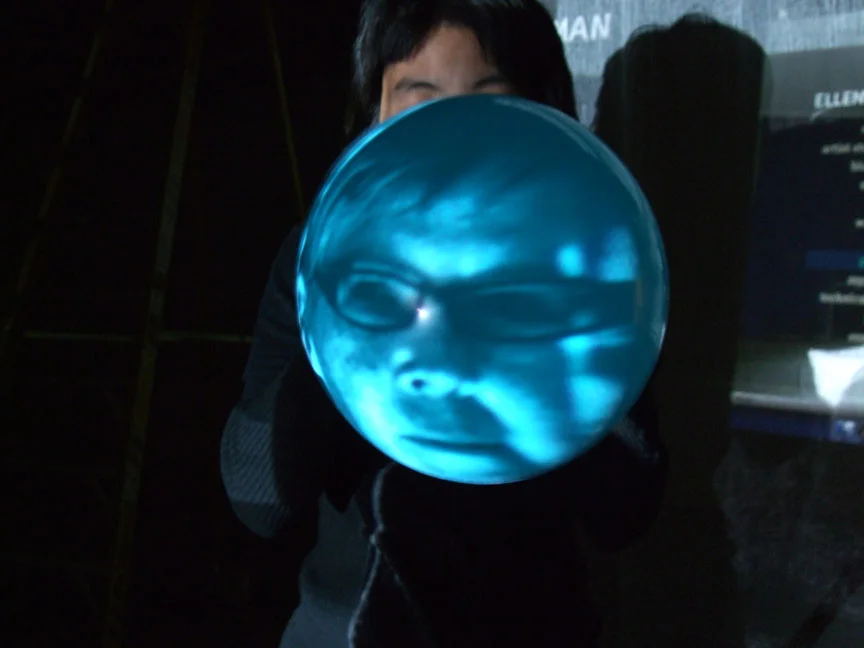 Live video of Fullman’s face reading cast members’ dream descriptions, projected onto balloons repeatedly blown up and released to fly away