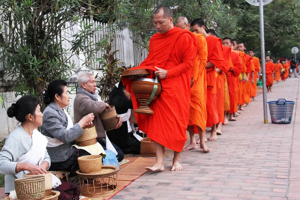 Giving Alms to Monks in Thailand — Chilling Elephant