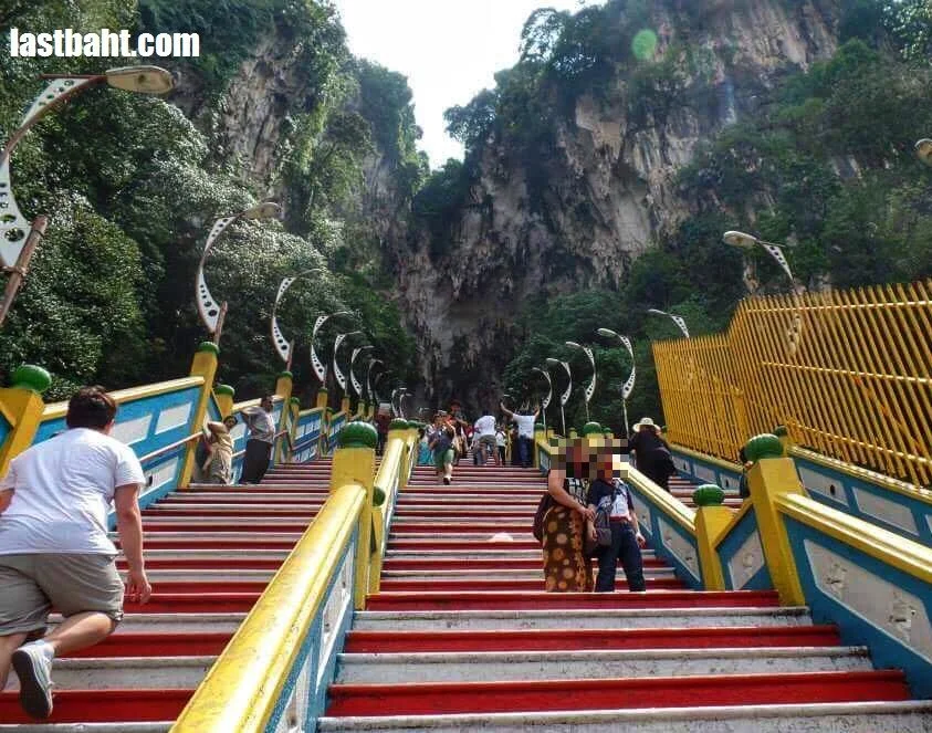  climb 272 steps to the entrance of Batu Caves 