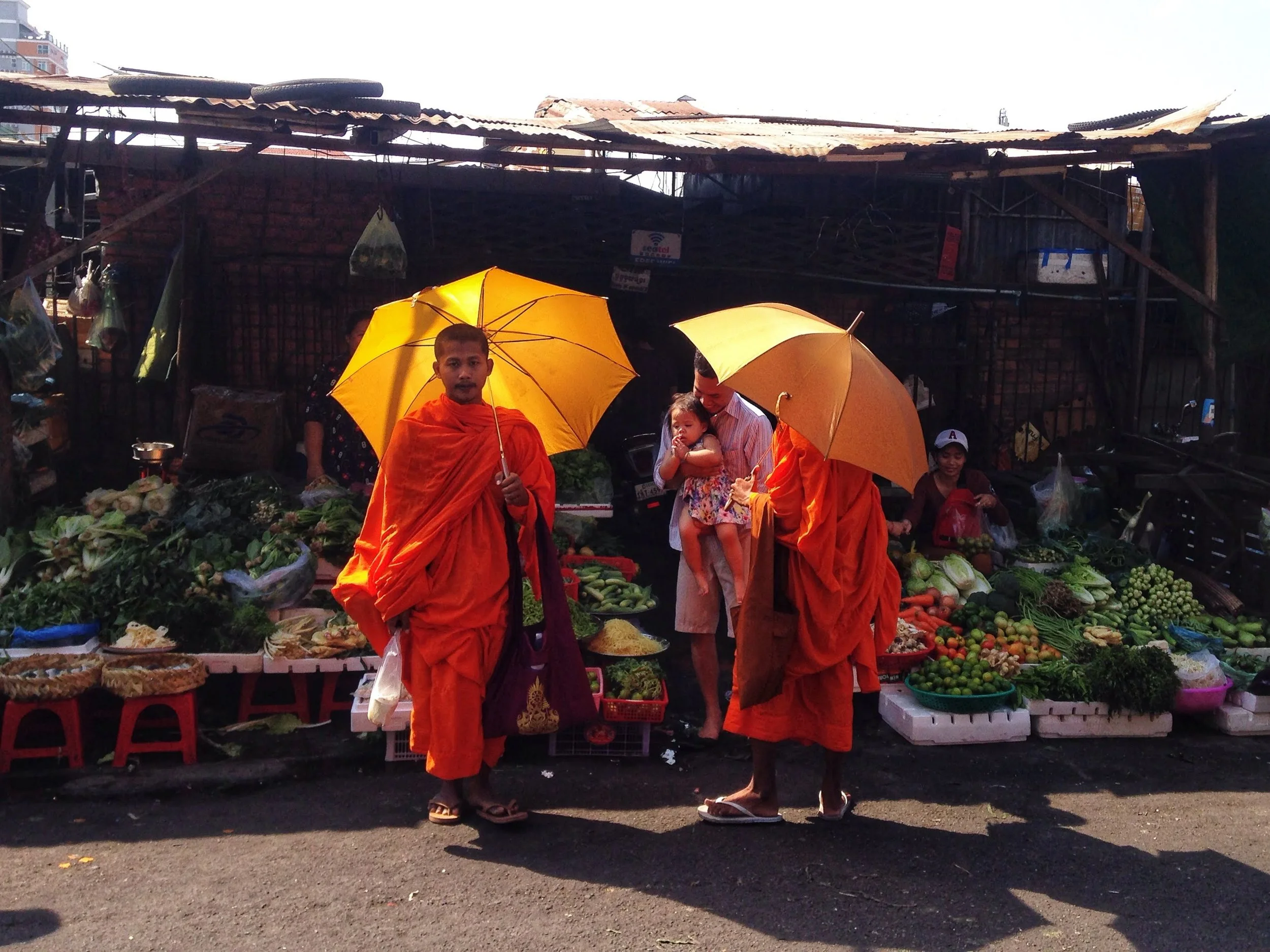  Buddhist monks collecting alms at the Russian Market in Phnom Penh 