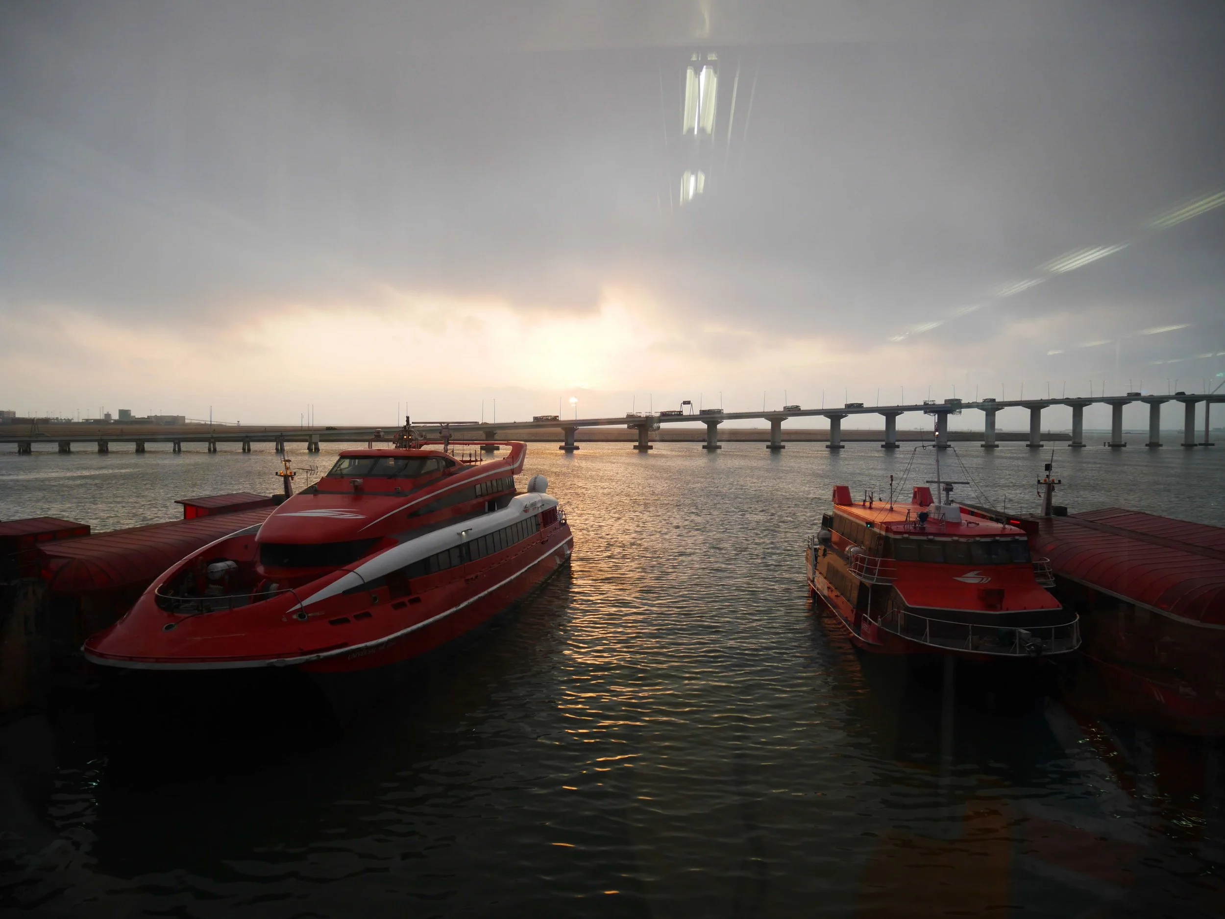  Two types of Macau-Hong Kong Ferry boats waiting to depart 