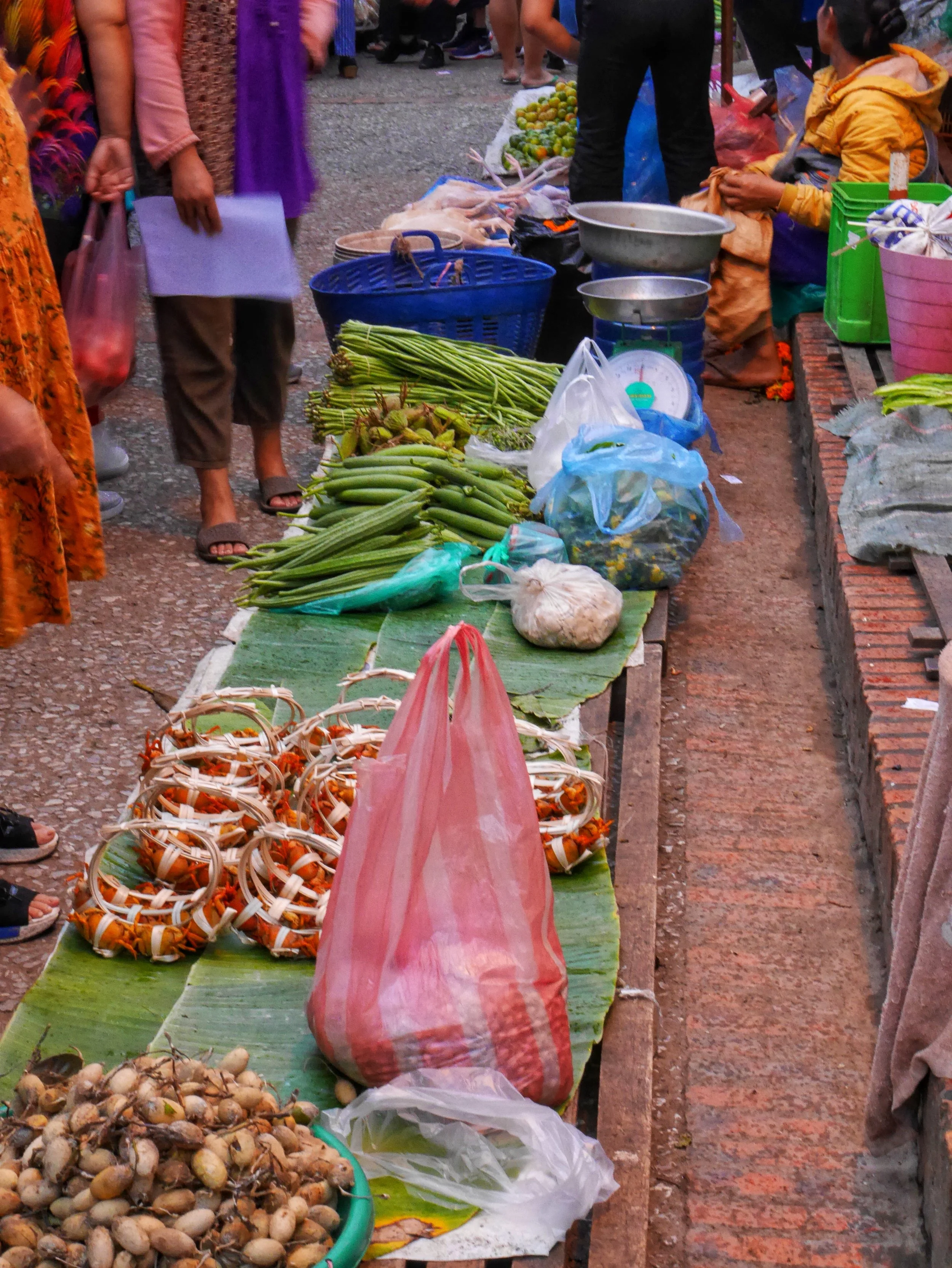  live crabs for sale along with various produce at Luang Prabang’s Morning Market 