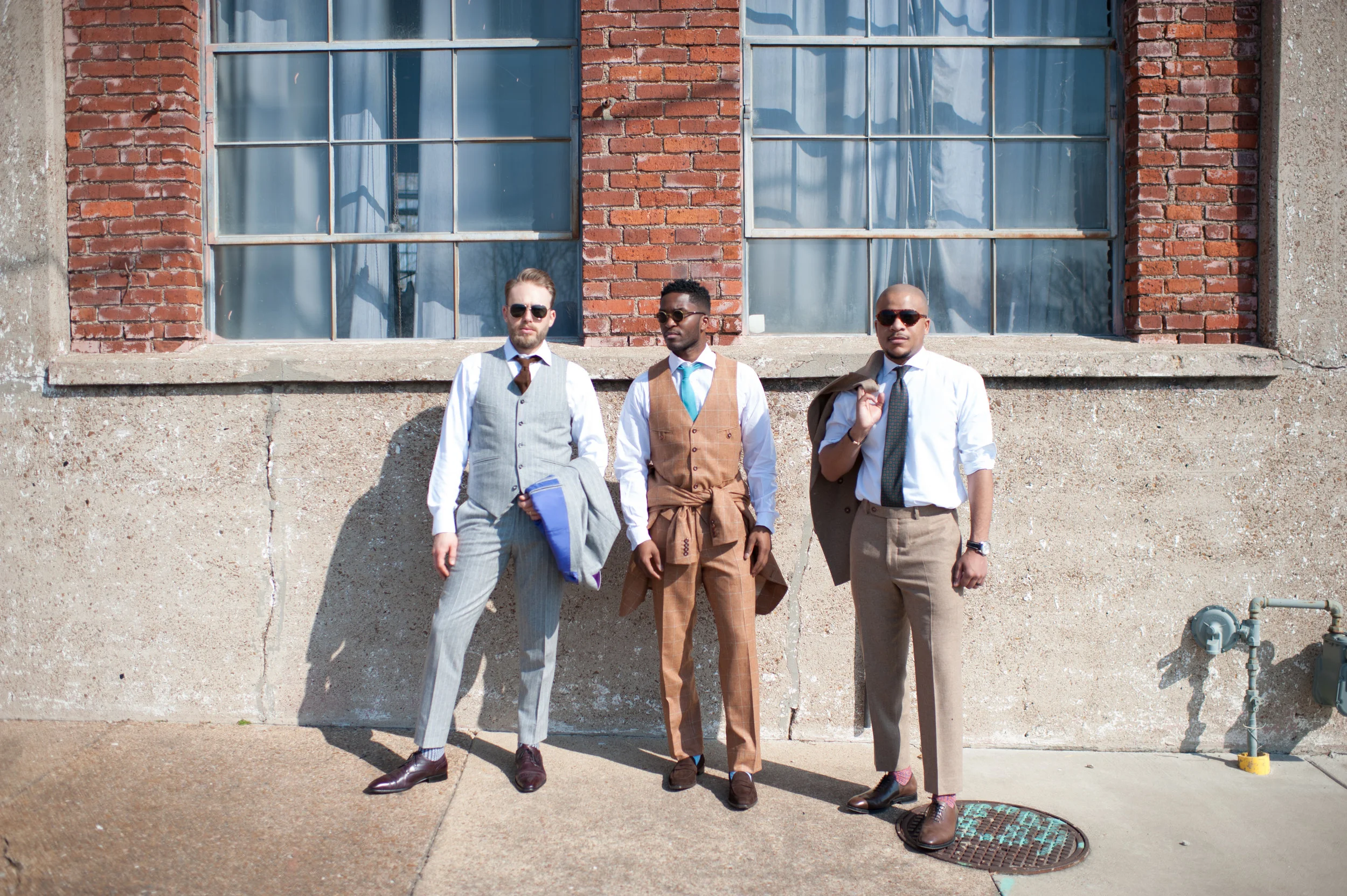 3 men with custom suit referrals.jpg