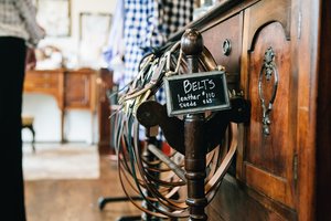a rack of custom belts in nashville