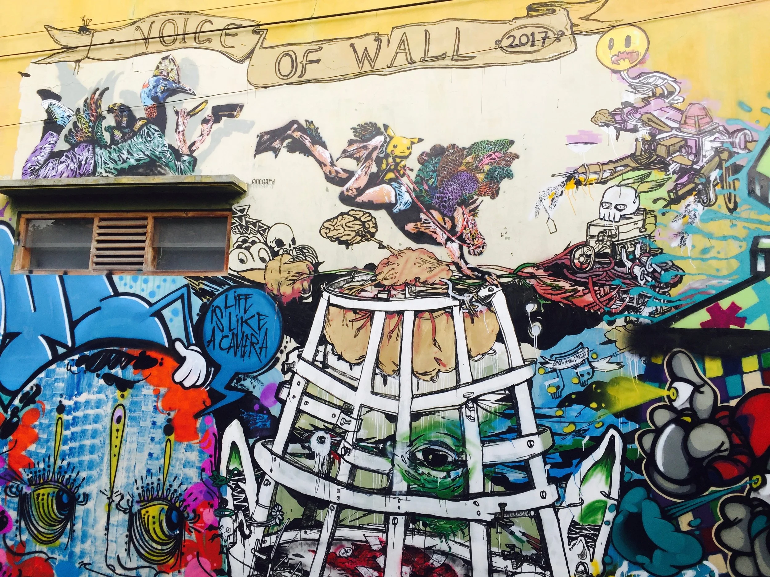 A collective mural in Yogyakarta featuring the works of many of the streets active in the city