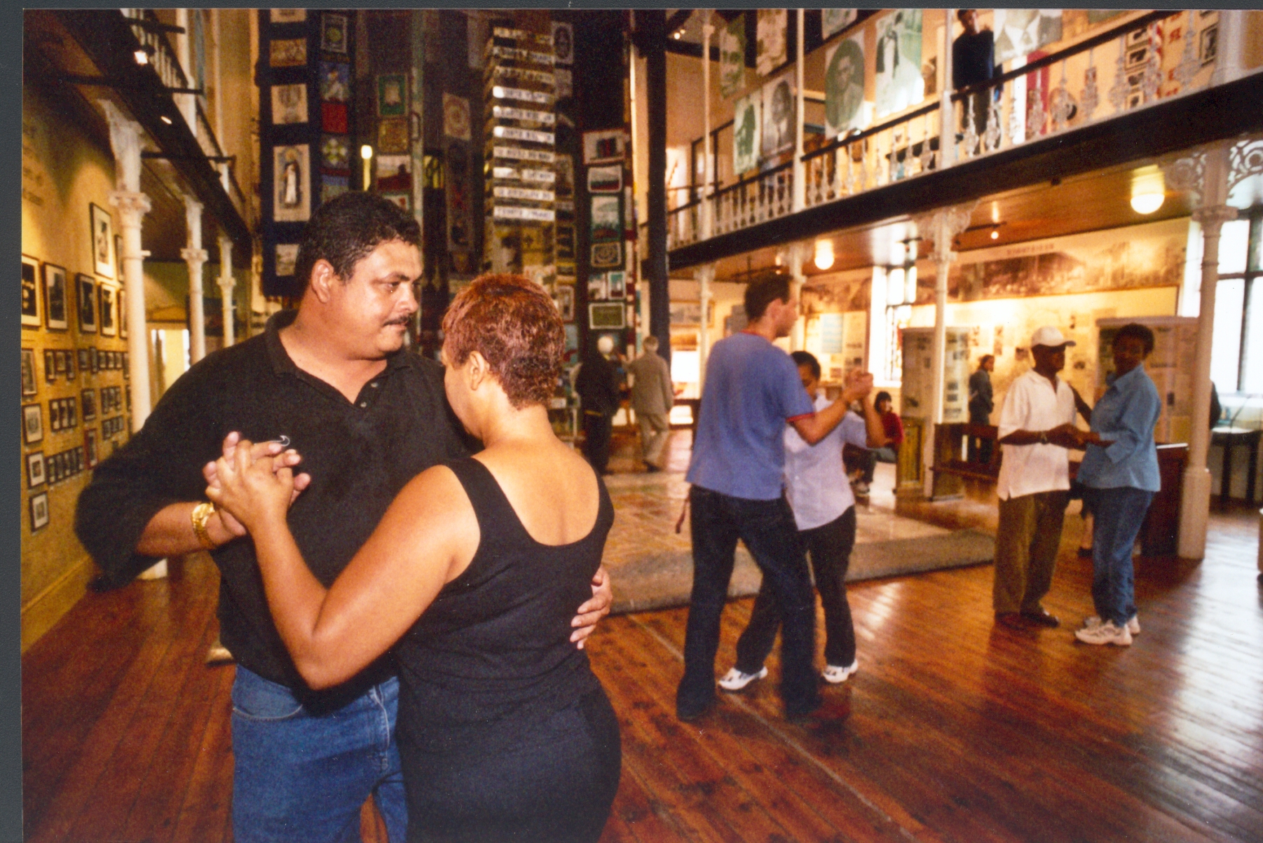 Square dancing in the District Six Museum, a community museum about forced removals in Cape Town. Photograph Garth Stead 