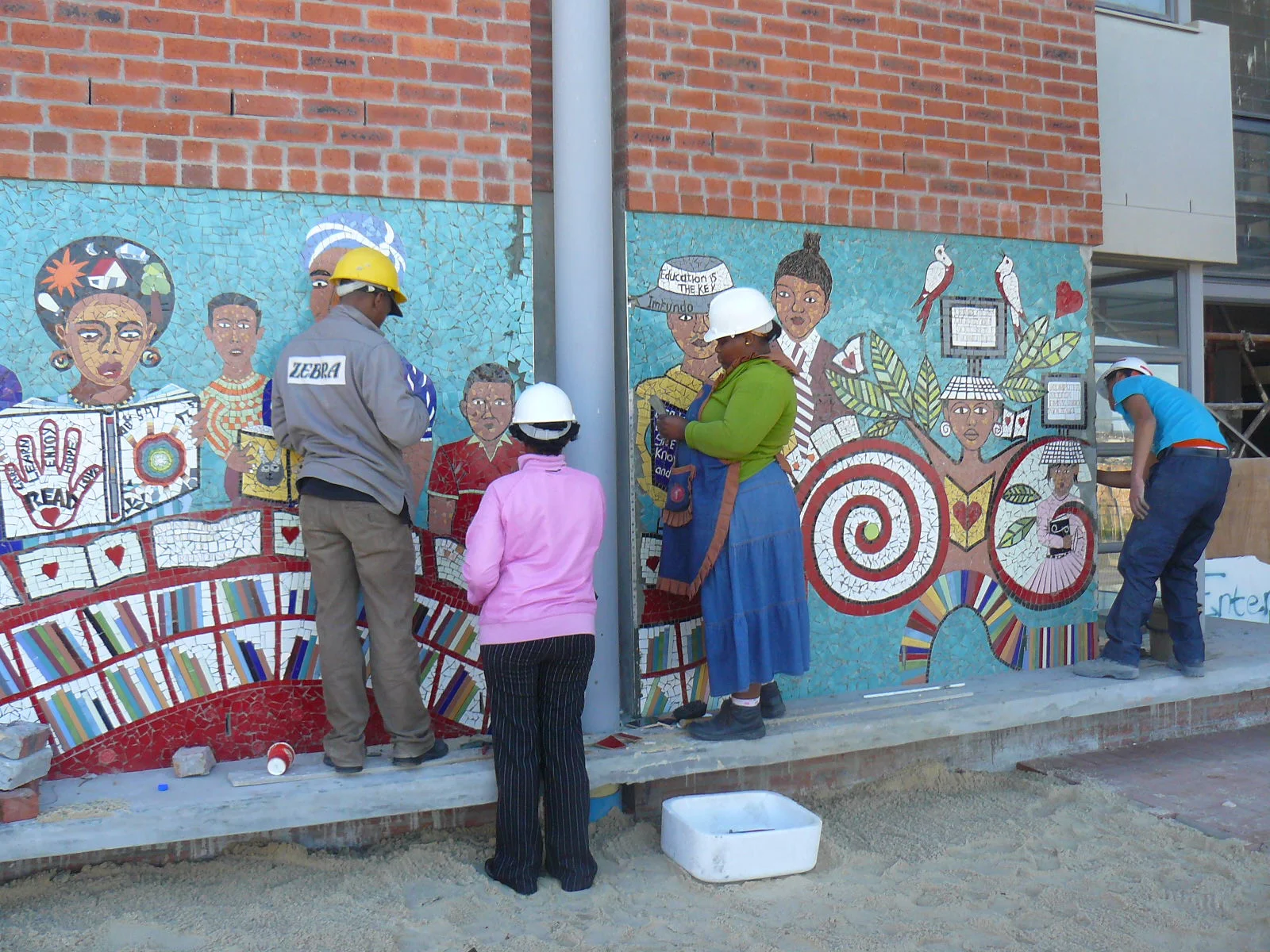 A community designed ceramic mural at the VPUU project. photo Alex Jongens 