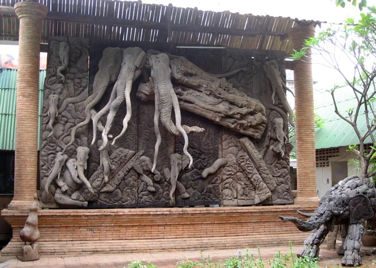 A kind-of-creepy elephant sculpture using naturally-shaped pieces of wood.