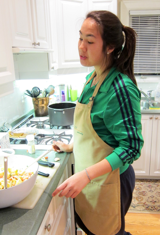 Culinary master Jasmine prepares a pasta salad for 8 hungry Tomczaks.