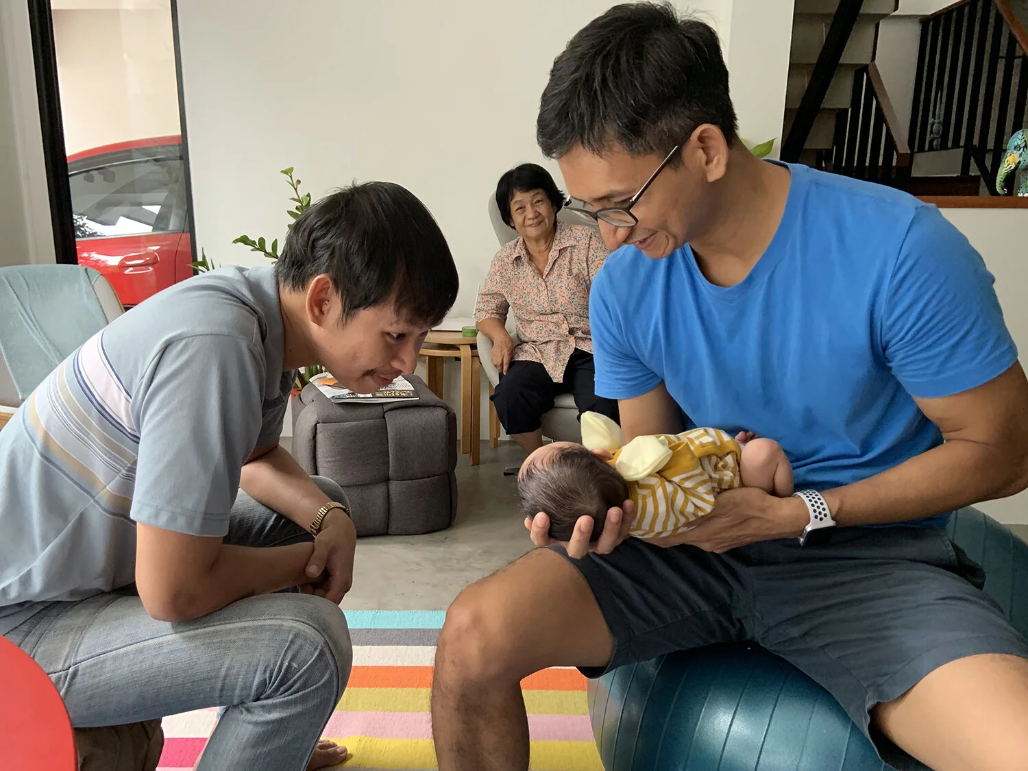 Saying hi to Uncle Top for the first time.