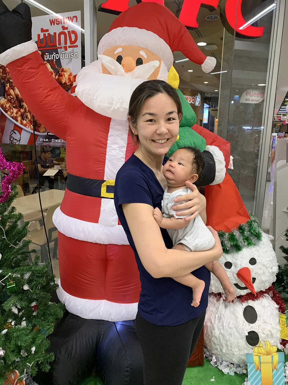 Stopping to pose with Santa before getting back on the road.