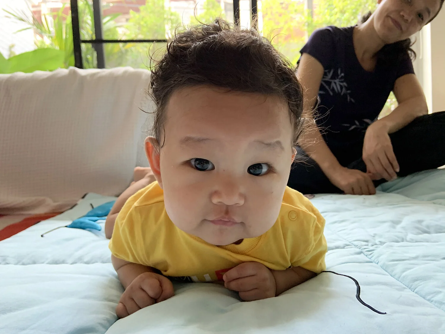 Practicing his rolls (and resulting tummy time) once again.