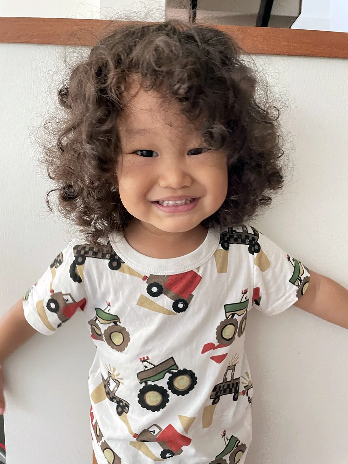 Cheese! A big grin for Mr. Big Hair -- for the last time!