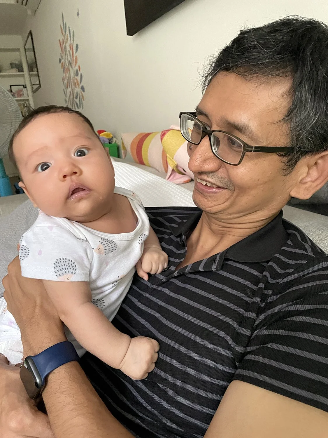 Attempting to pose with Dad.