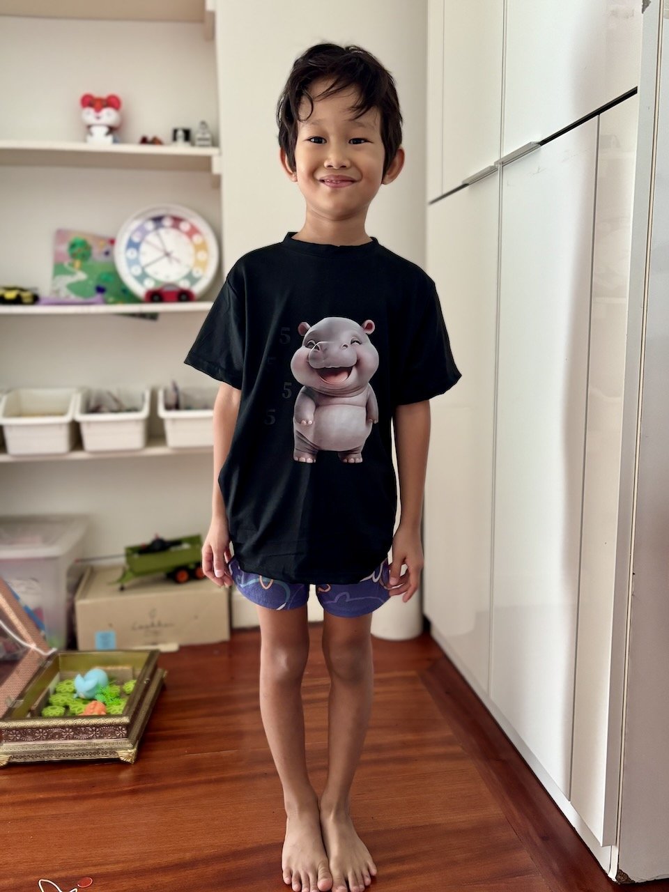 Arlo's wearing his Moo Deng shirt for the first time.