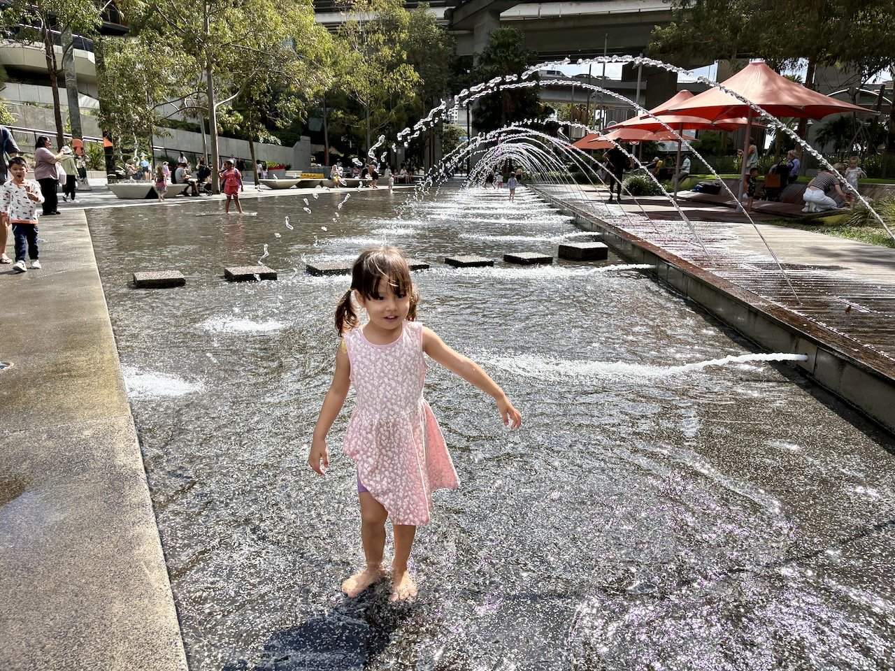 Does she dare walk under the tunnel of water?