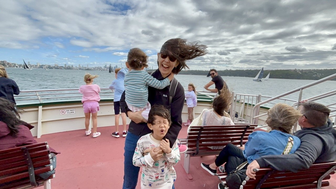 The wind at the front of the ferry was *intense*!