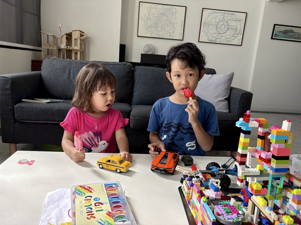 Enjoying the popsicles that Arlo brought back from swimming.