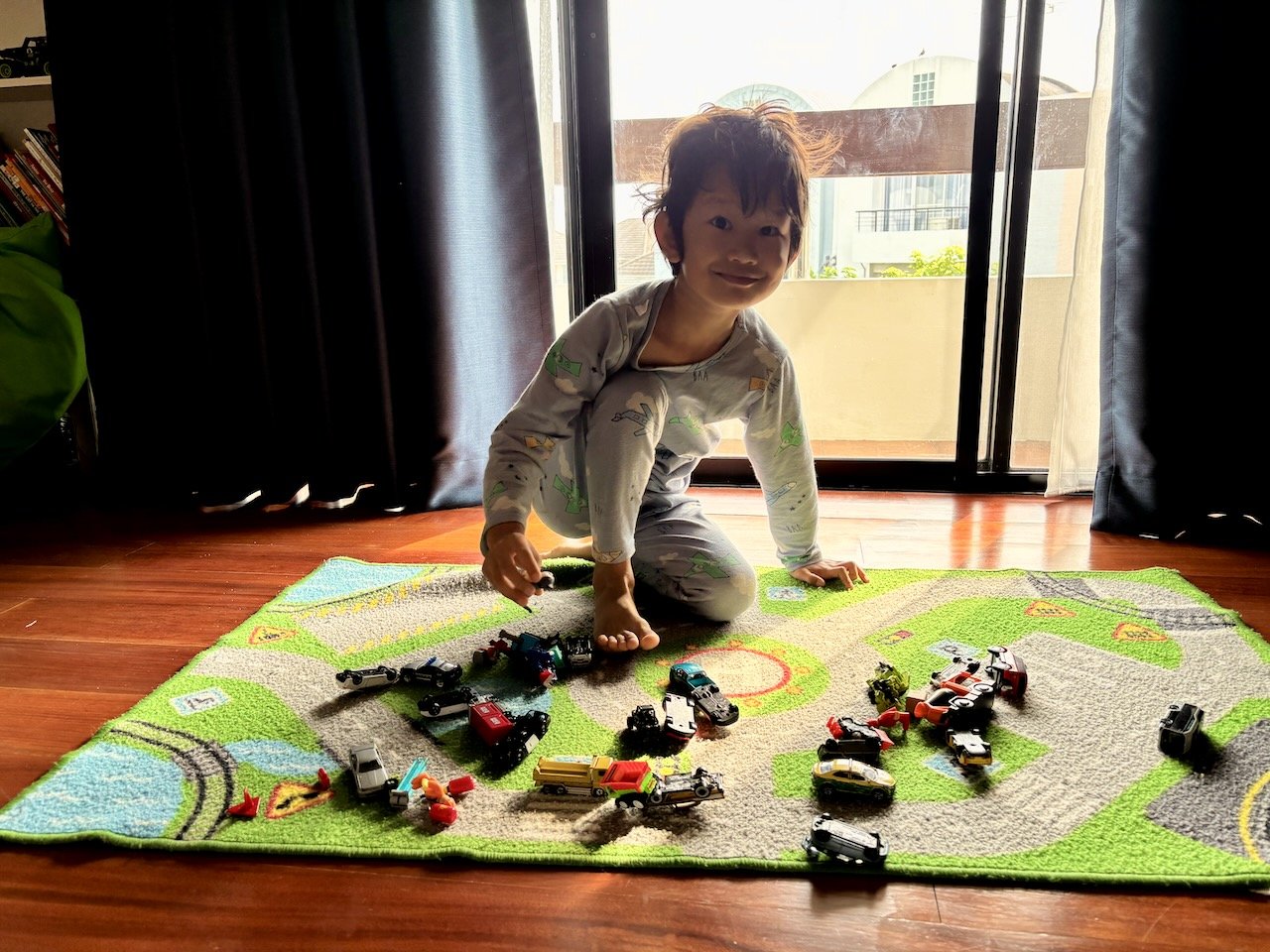 Playing with cars early on Sunday.