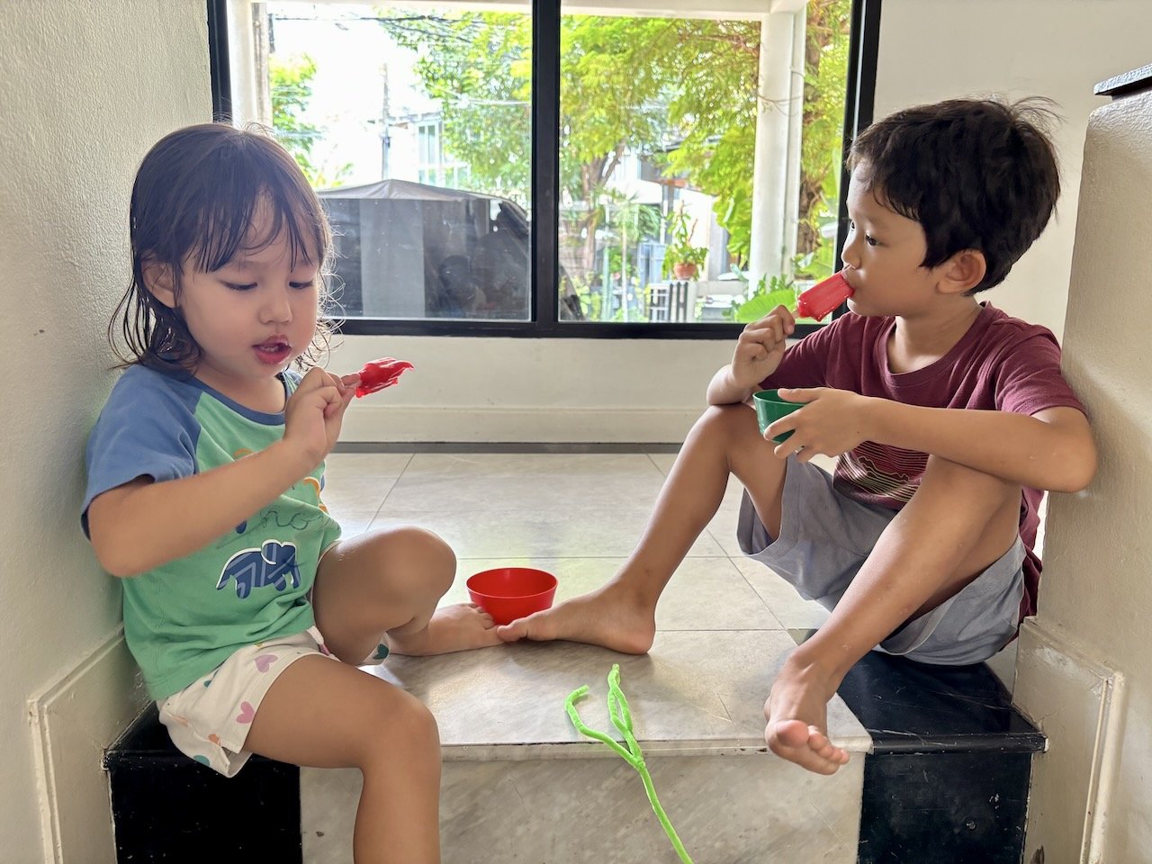 Lucy kindly brought popsicles back for herself and her brother.
