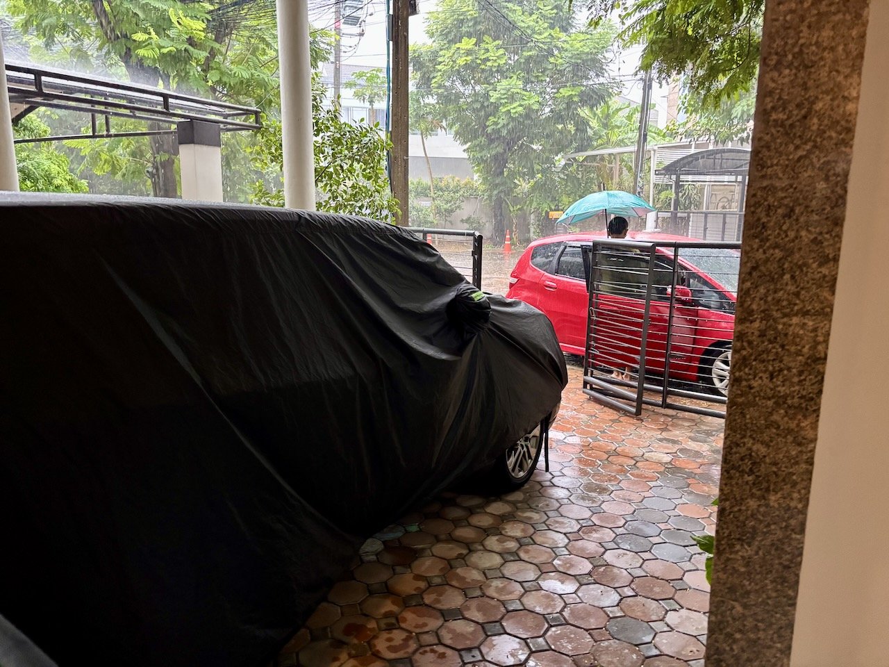 And then the storms came back, and we got stuck in front of the house in the red car.