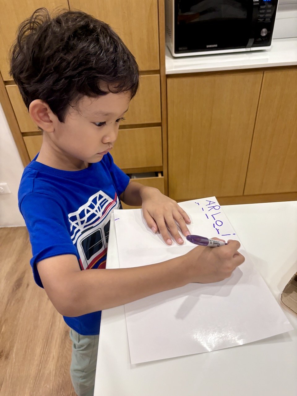 We need to bring in a labeled lunch box for Arlo's field trip on Thursday.