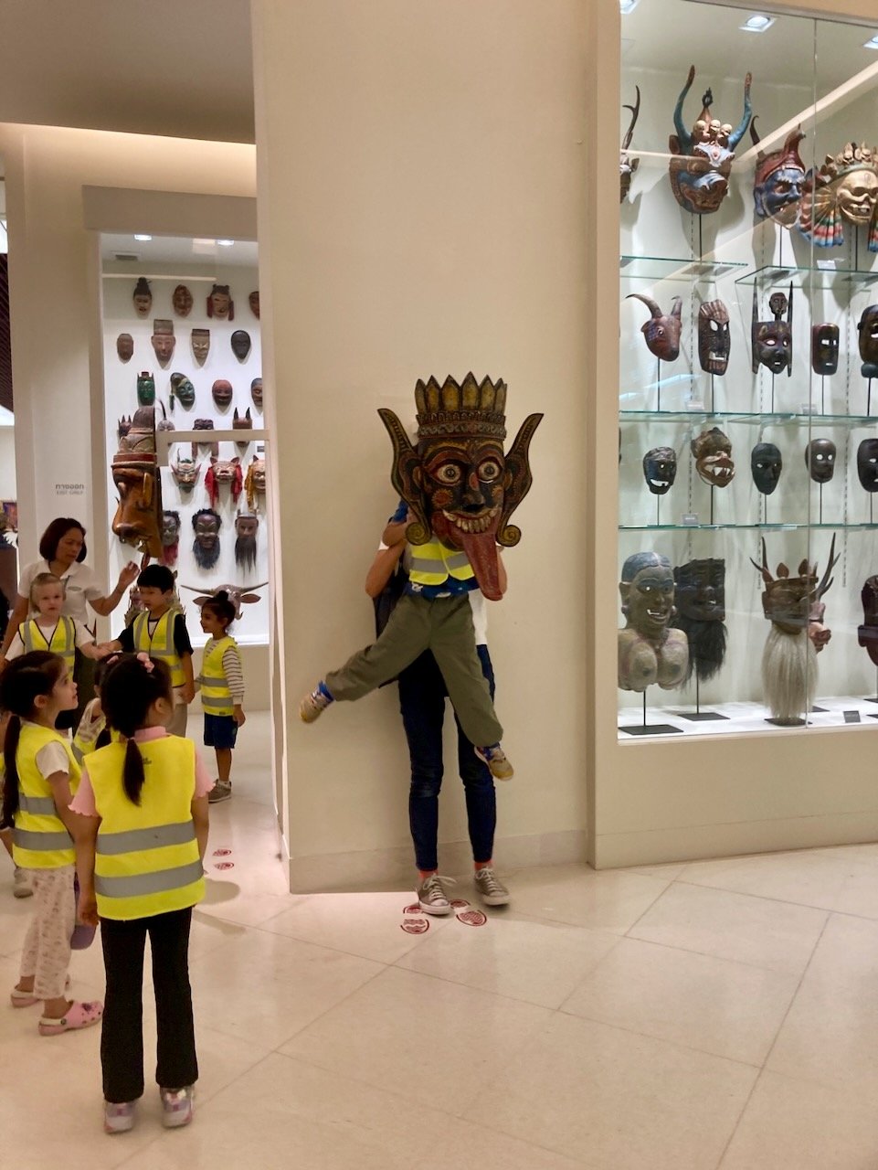 Got a good work-out lifting almost all of the 30 children to look through the mask.