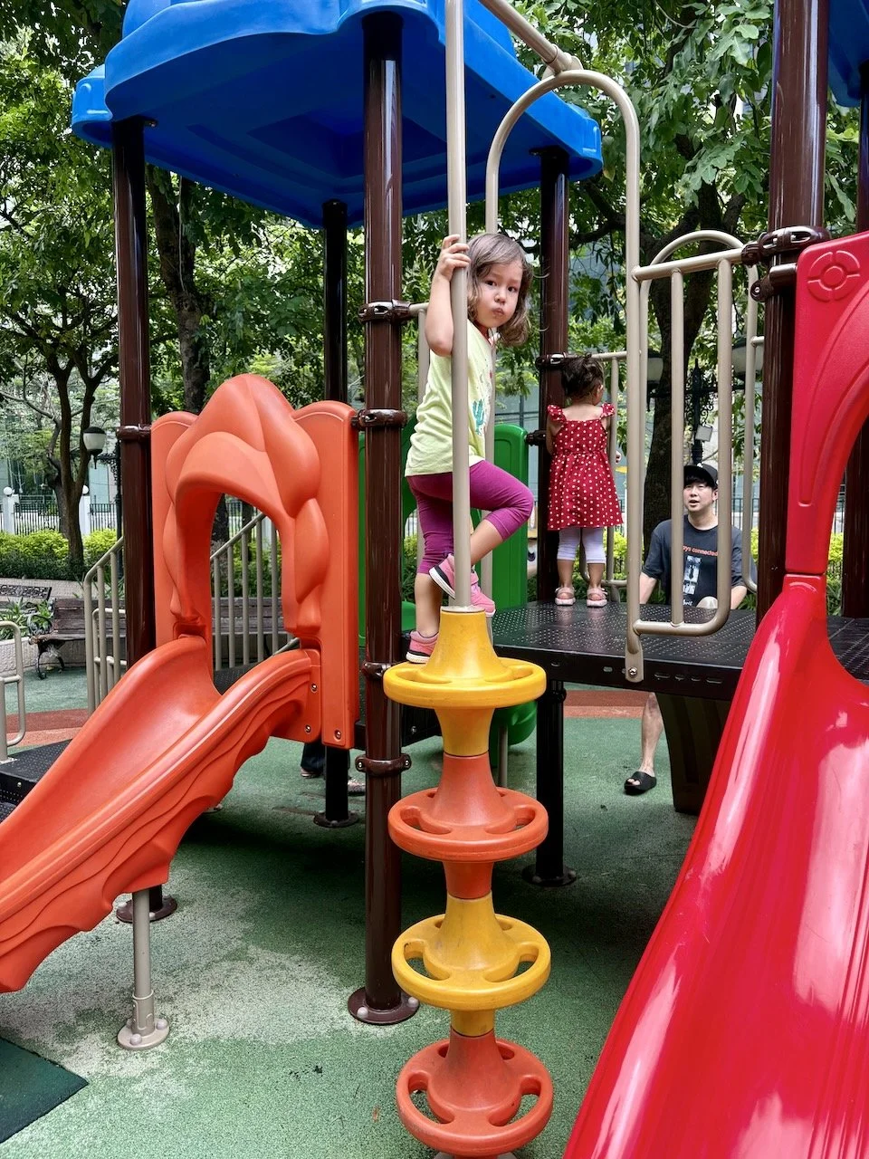 Nevermind that both playgrounds were in the sun.