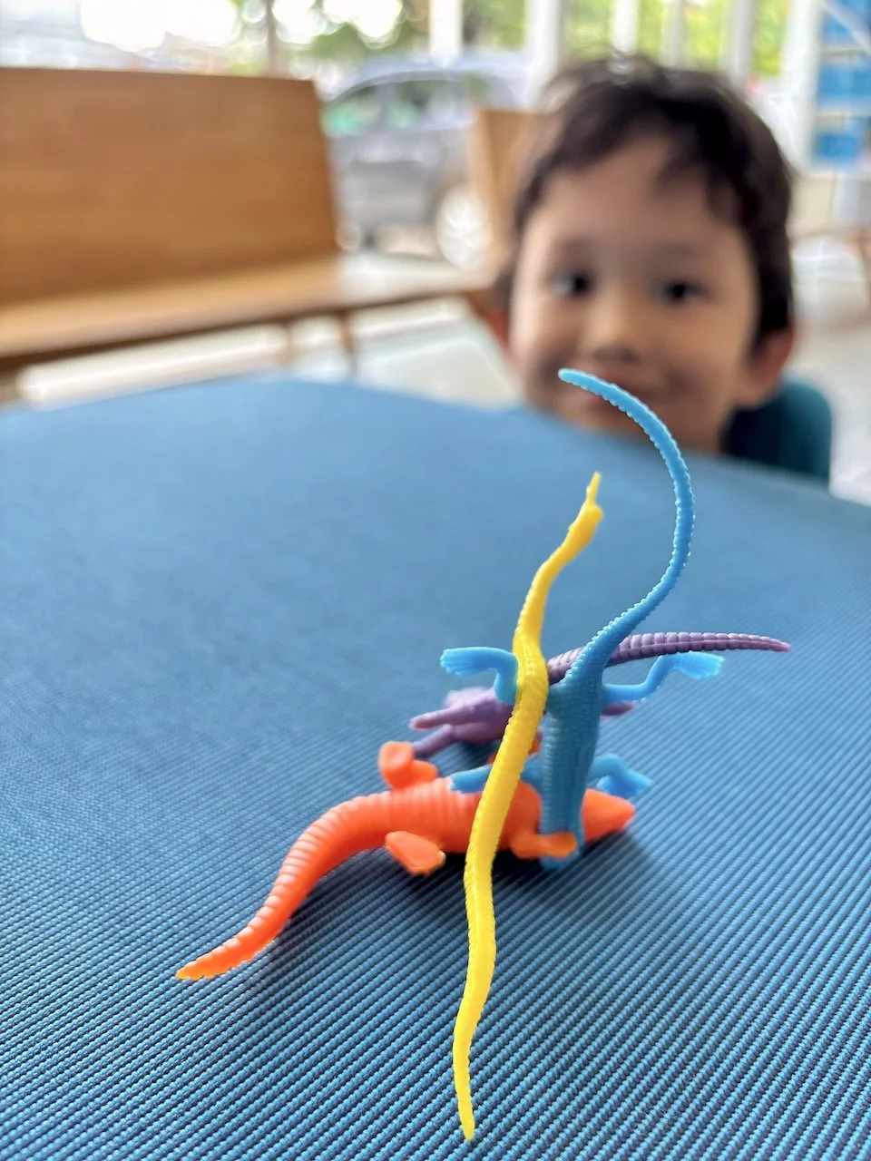 Arlo is very happy with the party favors he brought home (unofficially?)