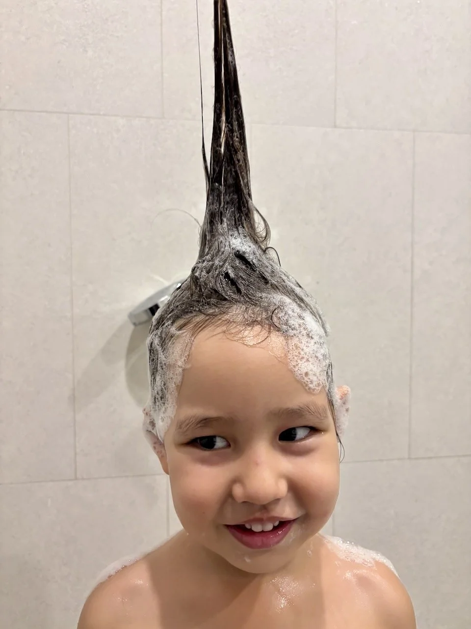 Lucy had her shampoo at Dad's salon tonight.