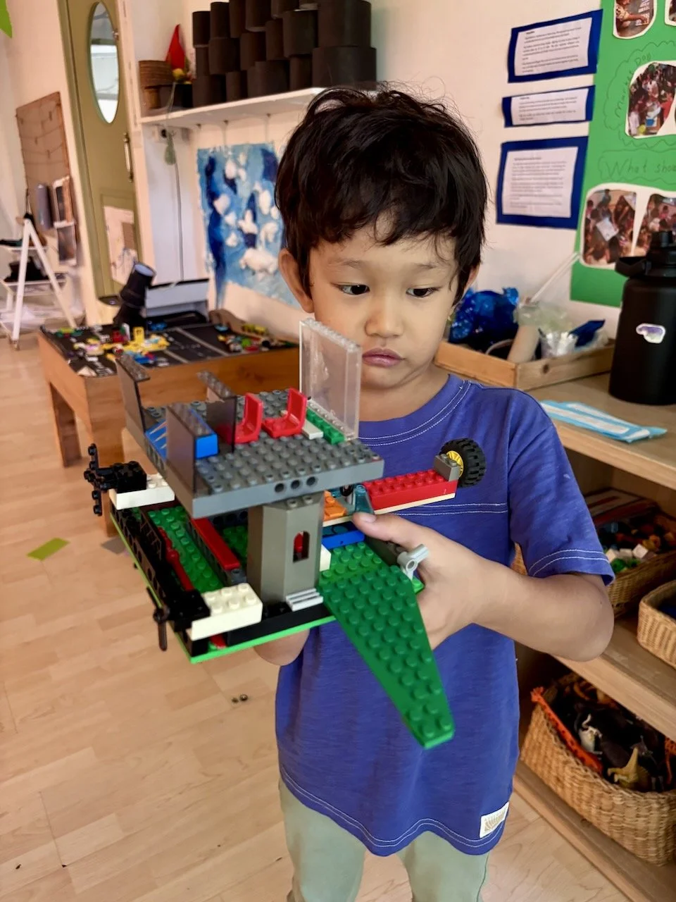 Quick peek in to see his latest flying contraption.